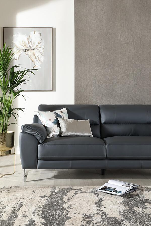 Metallic accents and a leather sofa makes a space feel modern.